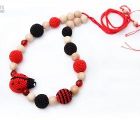 Nursing Juniper necklace /Teething amigurumi toy Ladybug - sling mom accessory